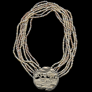 PERLE in perle e argento (gioiello)